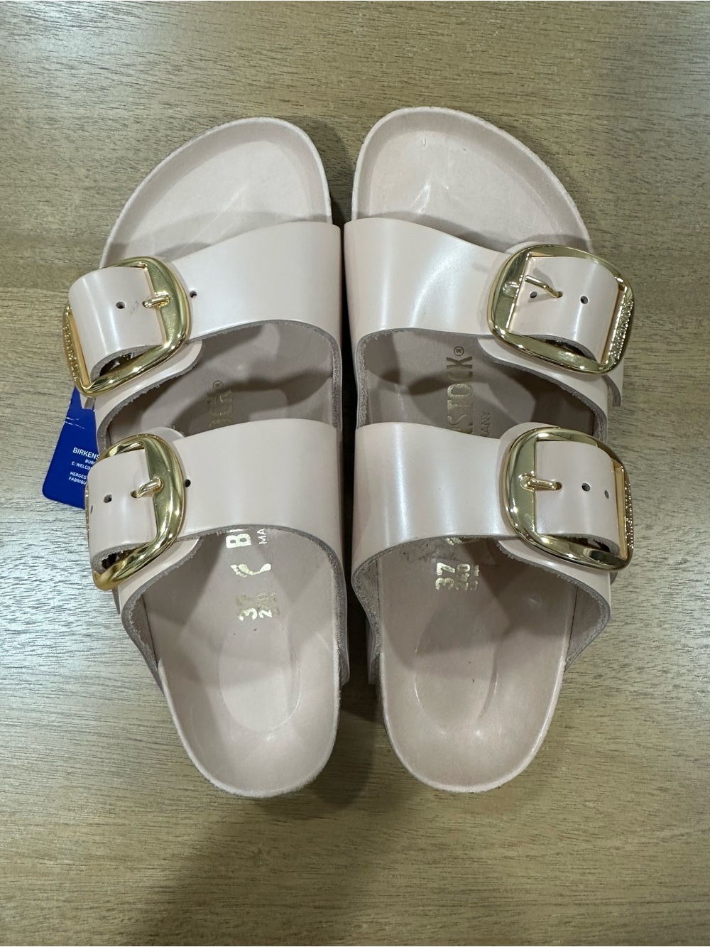 Birkenstock Arizona Leather Sandals in Pale Pink with Gold Buckles